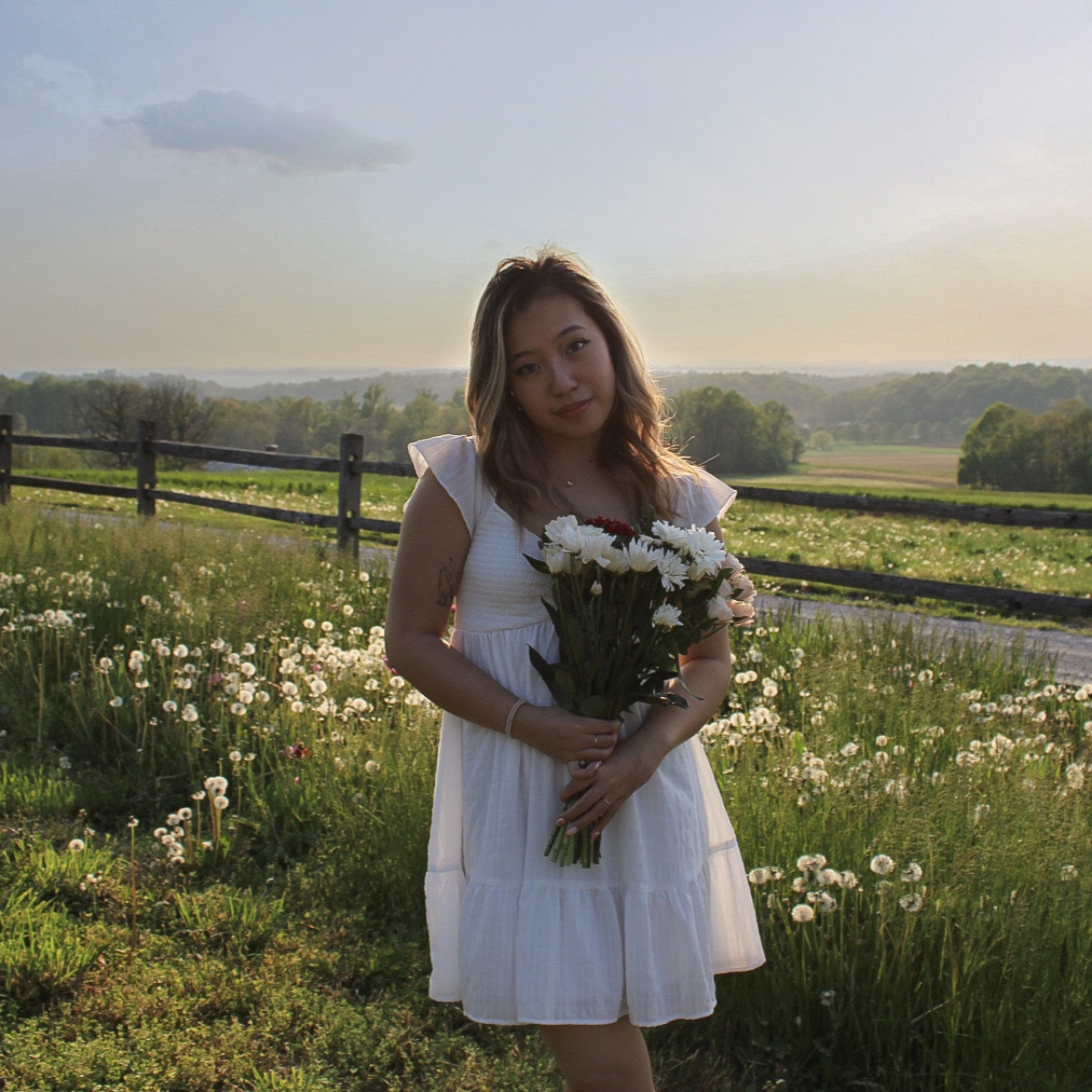 Thalene Nguyen holding flowers